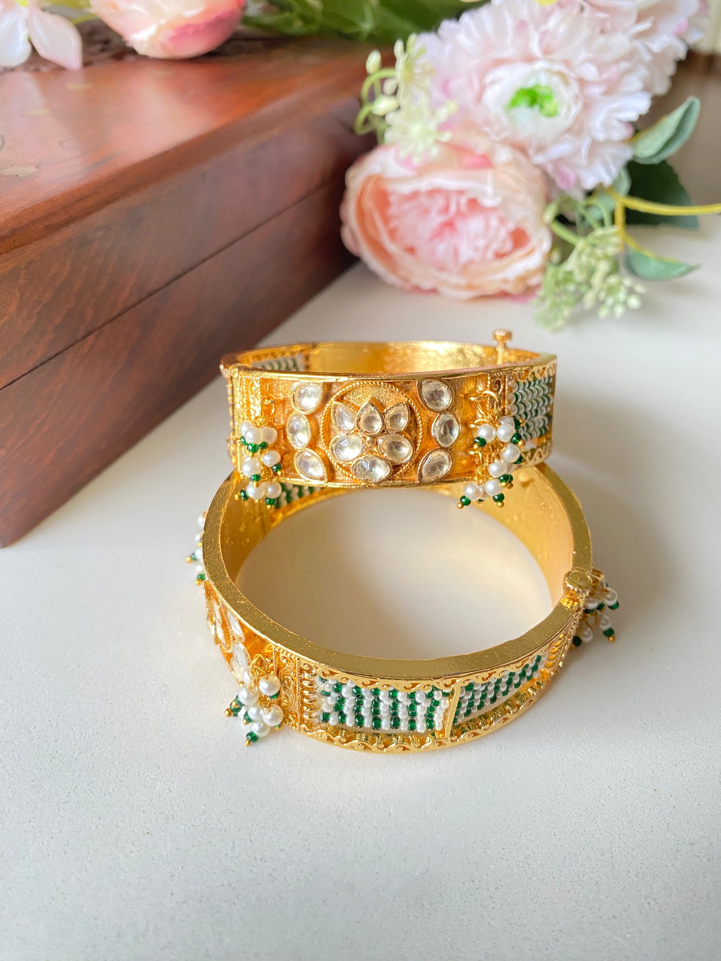 Gold plated Kundan Bangle in Green pearl detailing