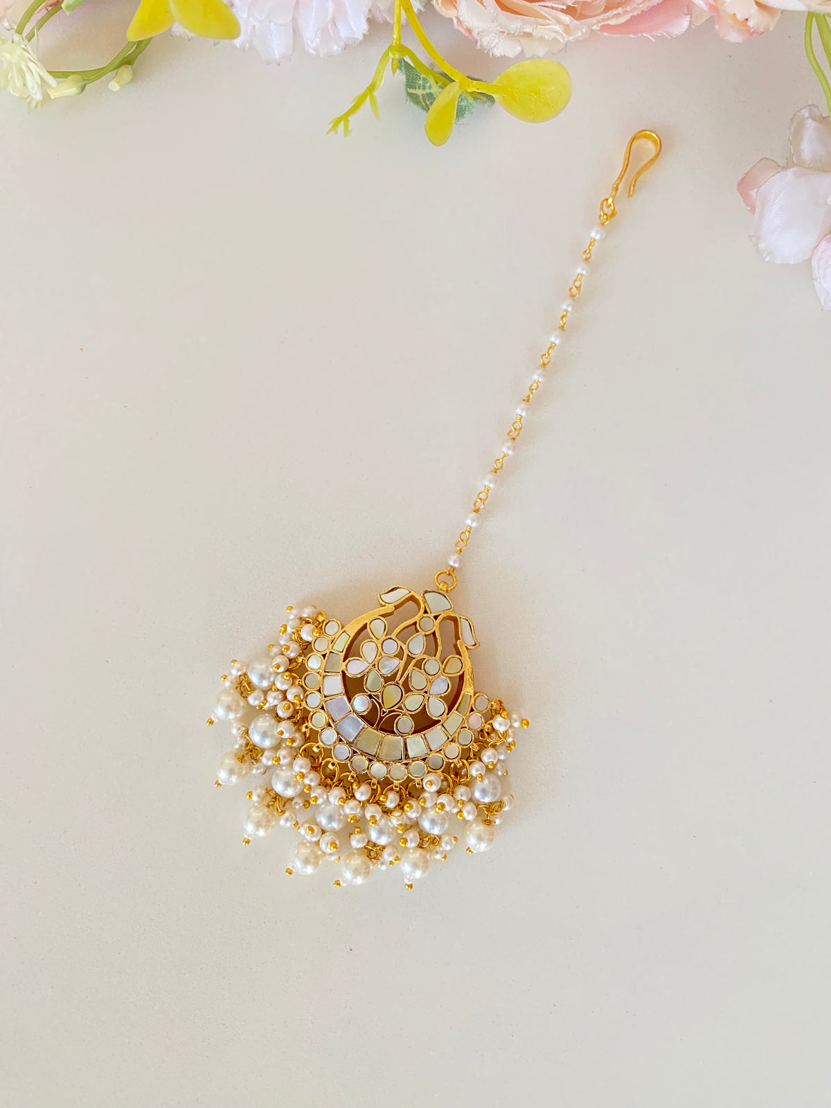 Mother of pearl tikka in pearl drops